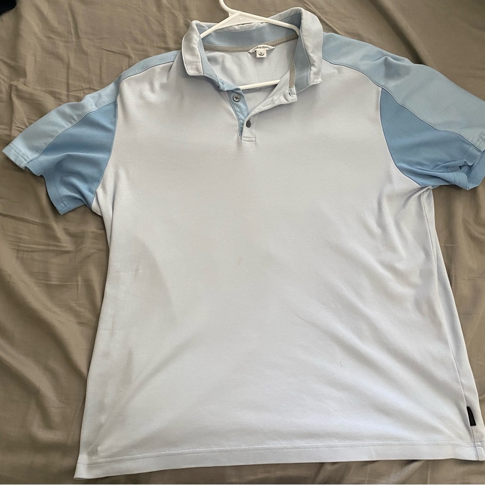 Calvin Klein Polo. Great condition. Large size but fits closer to a medium